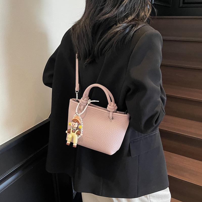 Fashion high-end hand bucket bag spring and summer simple and versatile shoulder bag trendy niche messenger bag
