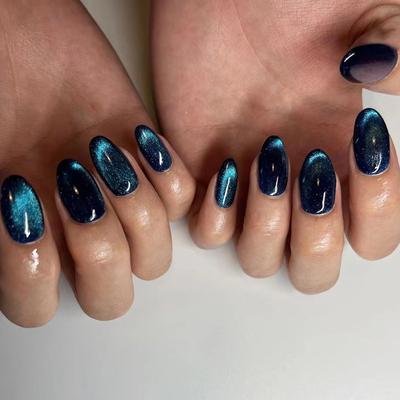 Elegancki i głęboki koci manicure oko owalny okrągły paznokieć słodki i chłodny biały sztuczny paznokieć wykończony paznokieć