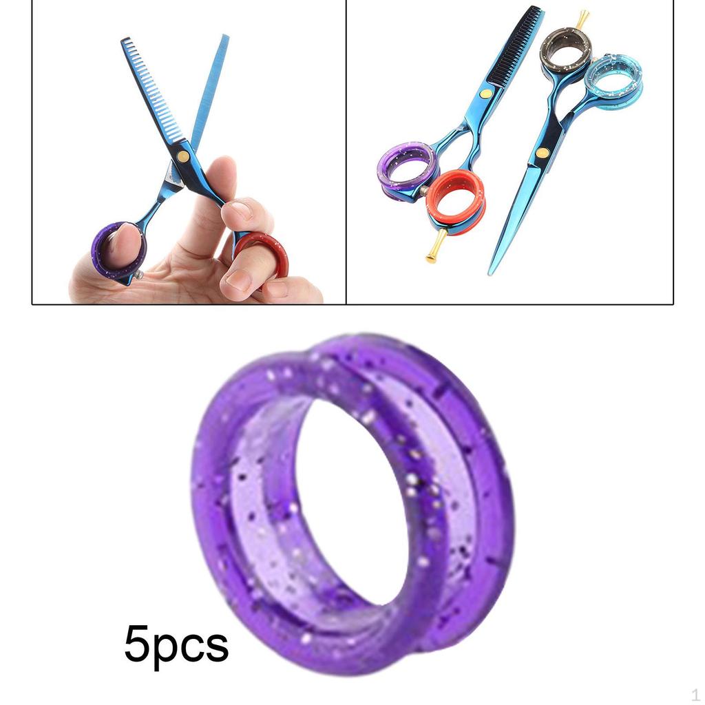 5-teiliges Scheren-Set mit Fingerringen, Griffeinsätzen und Zubehör für die Haarpflege.
