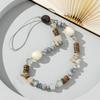 New Bohemian holiday style natural gravel mobile phone chain personalized niche crystal pearl mobile phone lanyard