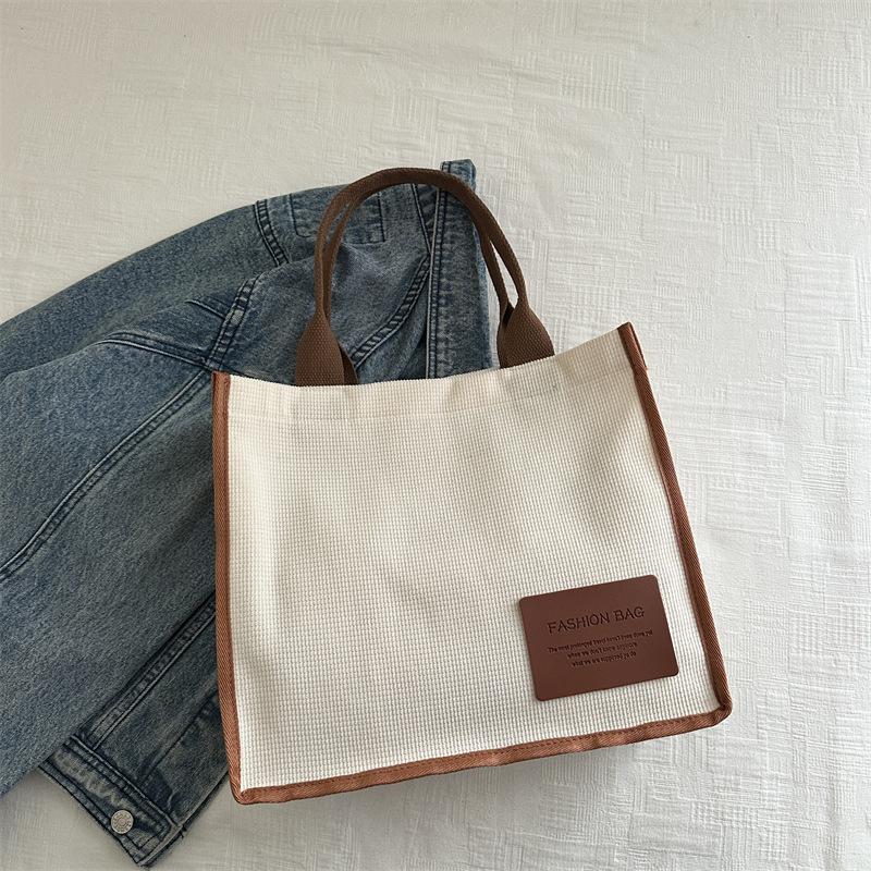 2025 summer new literary and artistic large-capacity class shoulder portable messenger bag casual simple canvas women's bag