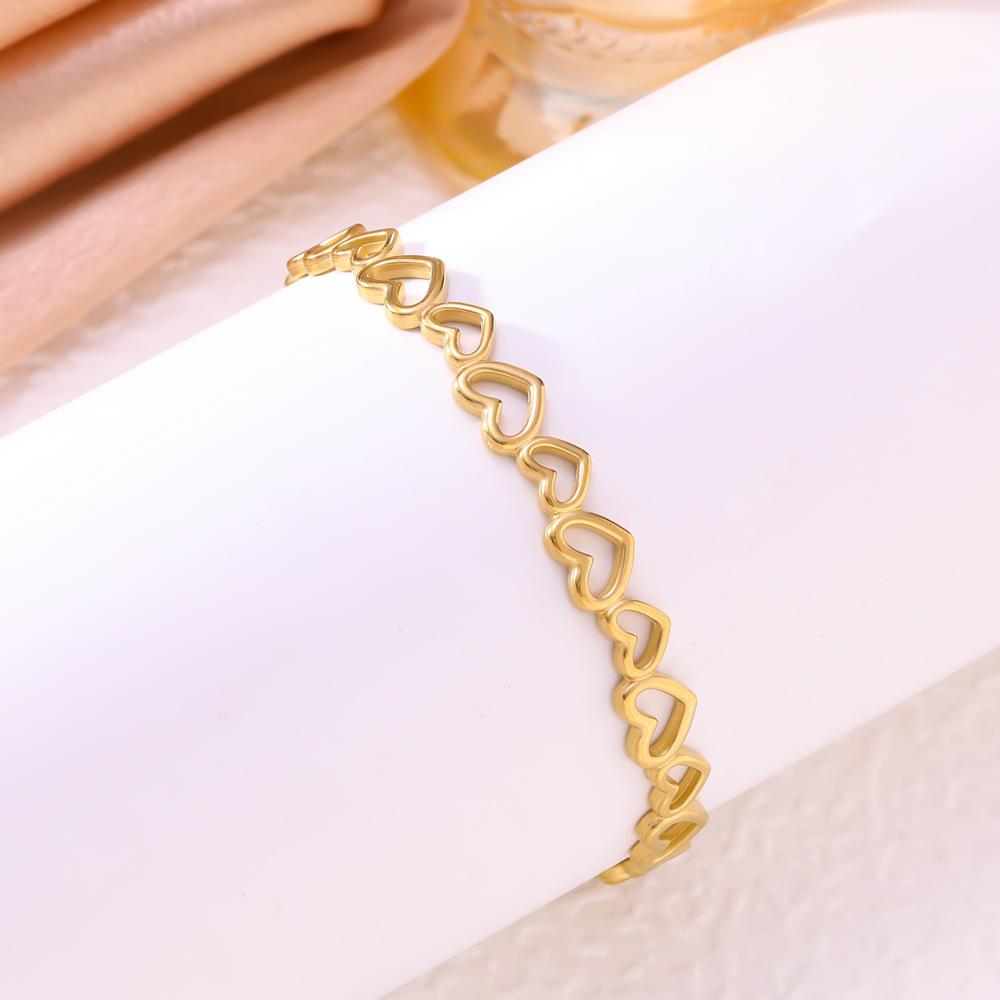 Heart-to-Heart Titanium Steel Hollow Heart Bracelet - Adjustable, Simple, Trendy Women's Bangle