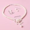 Imitation Pearl Jewelry Three-Piece Set An imitation pearl necklace A pair of faux pearl earrings