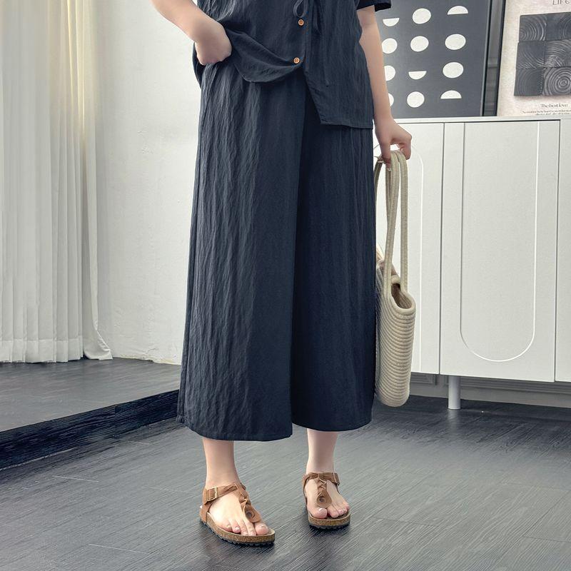 

Женская одежда больших размеров [Супер стройнящий ленивый комплект] Текстура Кукольный воротник Рубашки с коротким рукавом Кюлоты с широкими штанинами Набор из двух предметов Navy blue-Pantyskirt 6XL