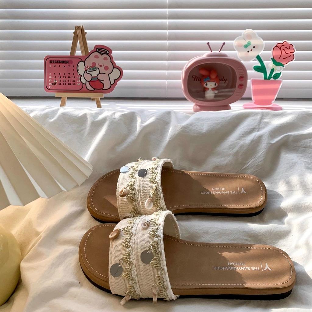Seaside vacation wind one-word casual with skirt shoes 2025 new flat-bottomed cross with cool slippers women's summer wear
