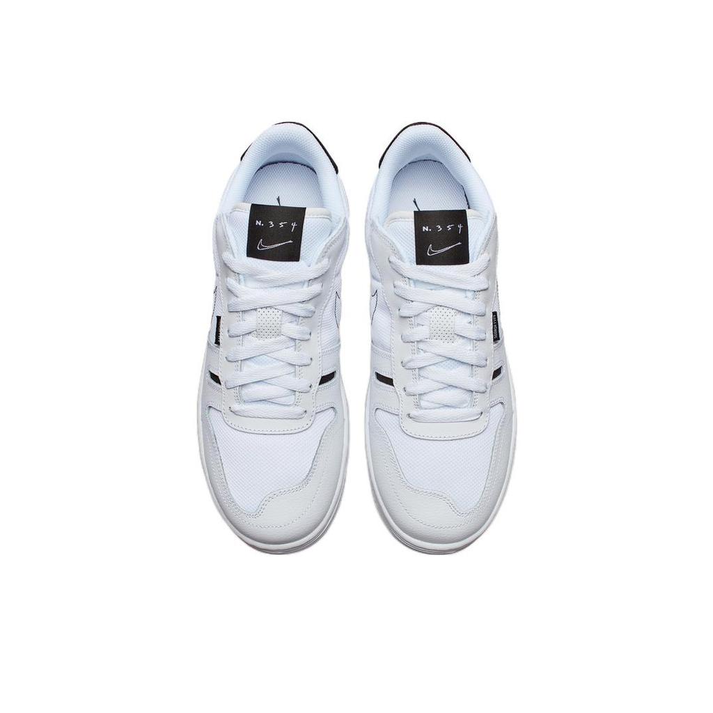 Nike Skórzana tkanina typu squash Odporne na poślizg Trwałe Lekkie Niskoprofilowe Buty do Skateboardingu Męskie Buty do Skateboardingu Czarno-Białe CT2922-100