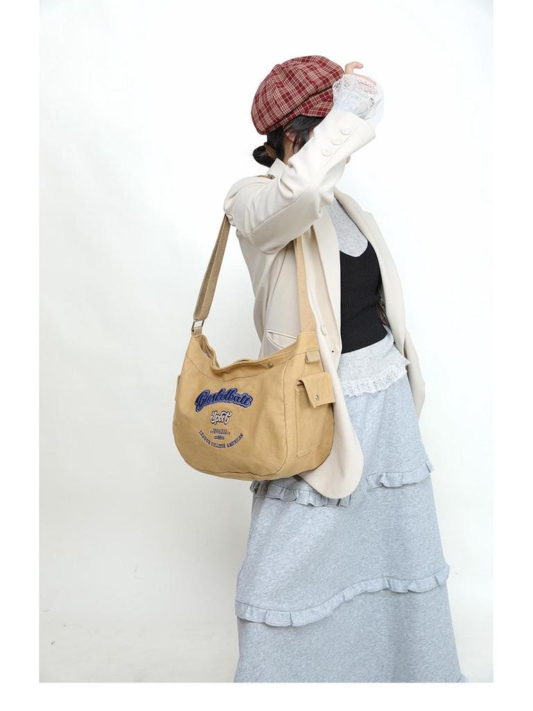 Korean Trendy Canvas Messenger Bag: Large Capacity for Women & Men, Sports Style