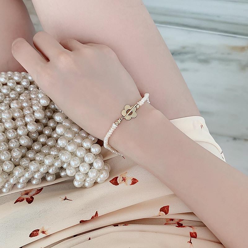 

Комплект колье и чокера из барочного пресноводного жемчуга с лепестковым дизайном