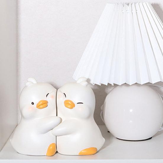 1 წყვილი Hug Duck Book End Cartoon მოცურების საწინააღმდეგო Heavy Duty Resin Craft Home Office Desktop Book Stopper Holder ცხოველთა ორნამენტი ფიგურა ფიგურა ქანდაკება
