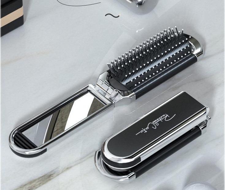 

Компактная складная расческа с воздушной подушкой и зеркальцем — мини-массажер и портативный аксессуар для ухода за волосами.