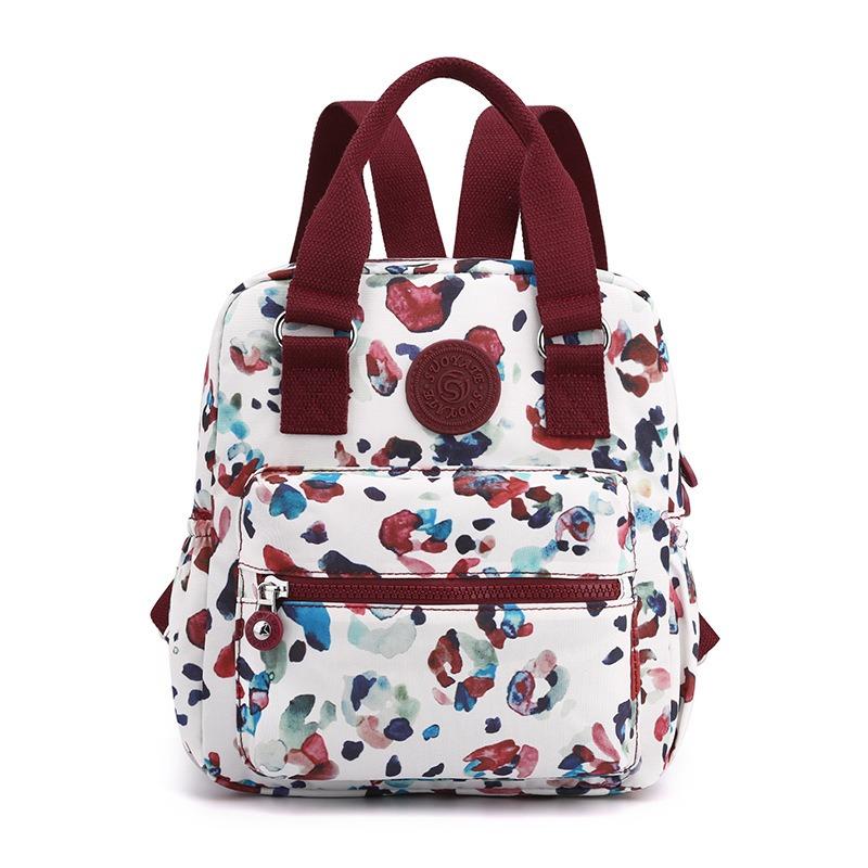Gedruckter Rucksack für Mütter mittleren Alters, Sommer, neue lässige Pendler-Handtasche, Nylon, modischer Rucksack