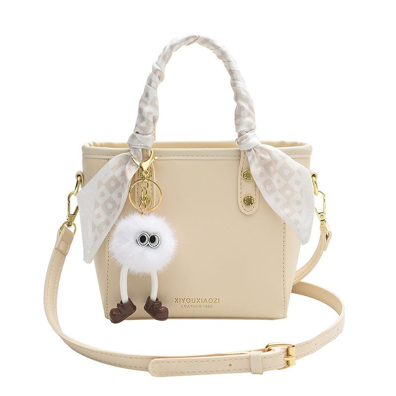 Stylish and simple portable bucket small bag women's 2025 new shoulder messenger bag solid color versatile shoulder bag