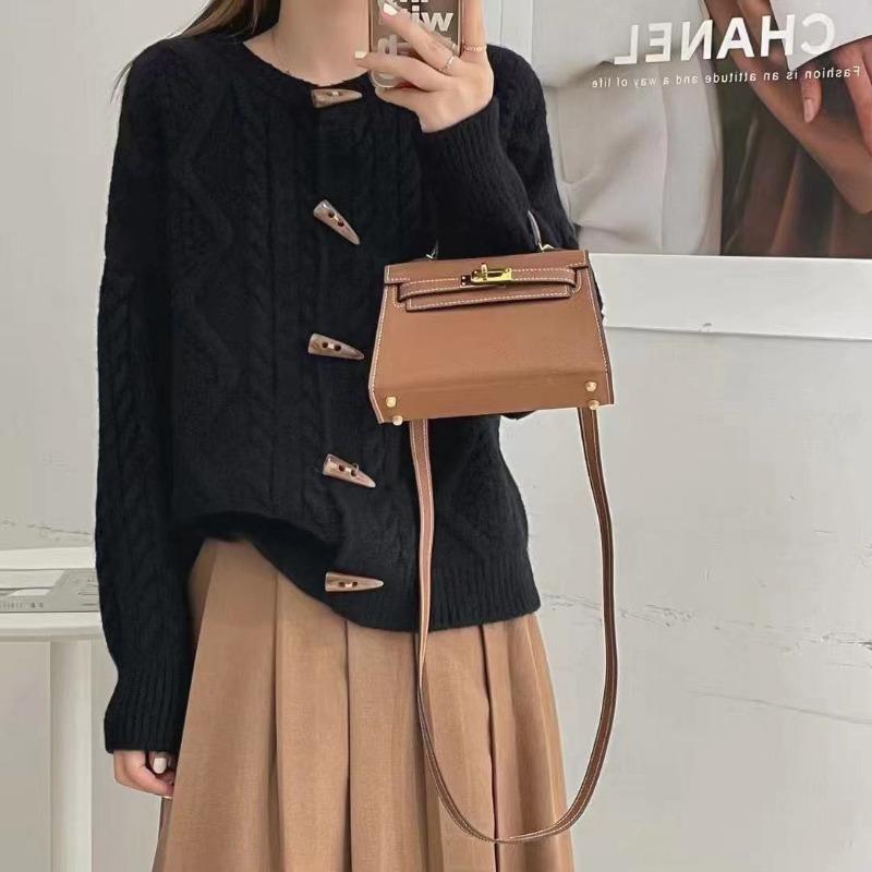 Retro twist sweater jacket women's autumn and winter horn buckle loose lazy knitted cardigan lazy style
