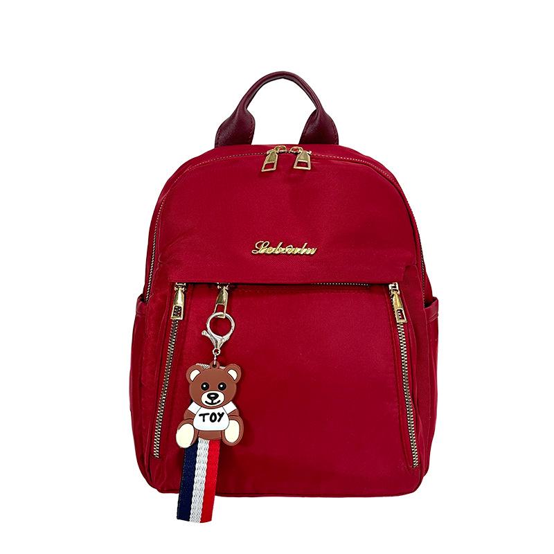 2026 Women s Trendy Large-Capacity Water-Resistant Backpack for Travel & School With Pendant