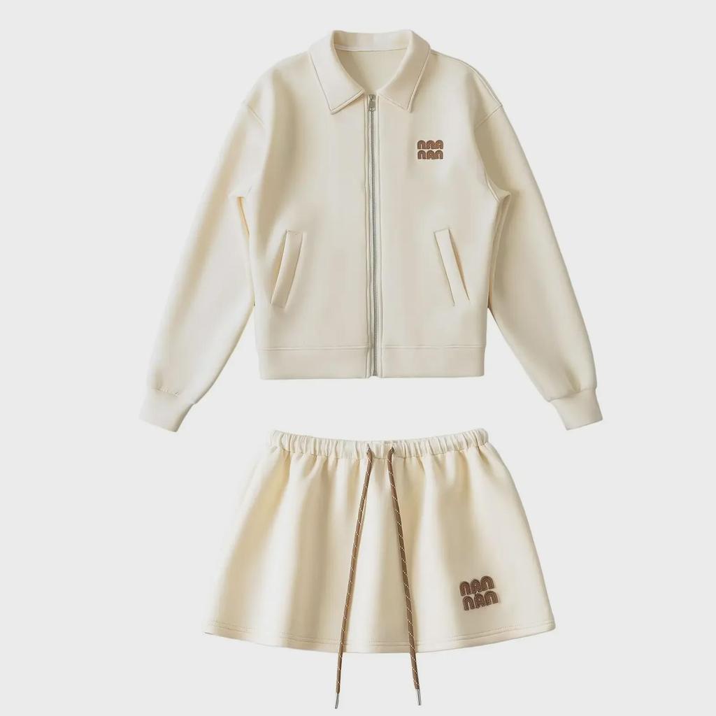 "Sweet Sports Style Mini Skirt: Elastic Waist, Air Layer Embroidery, Anti-Exposure, Versatile Sweater Material for Women."