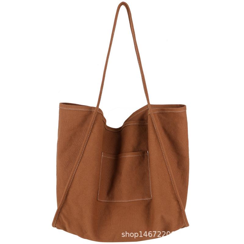 

Solid color canvas bag women s large-capacity bag Korean lazy wind shoulder bag popular washing water bag spot коричневый