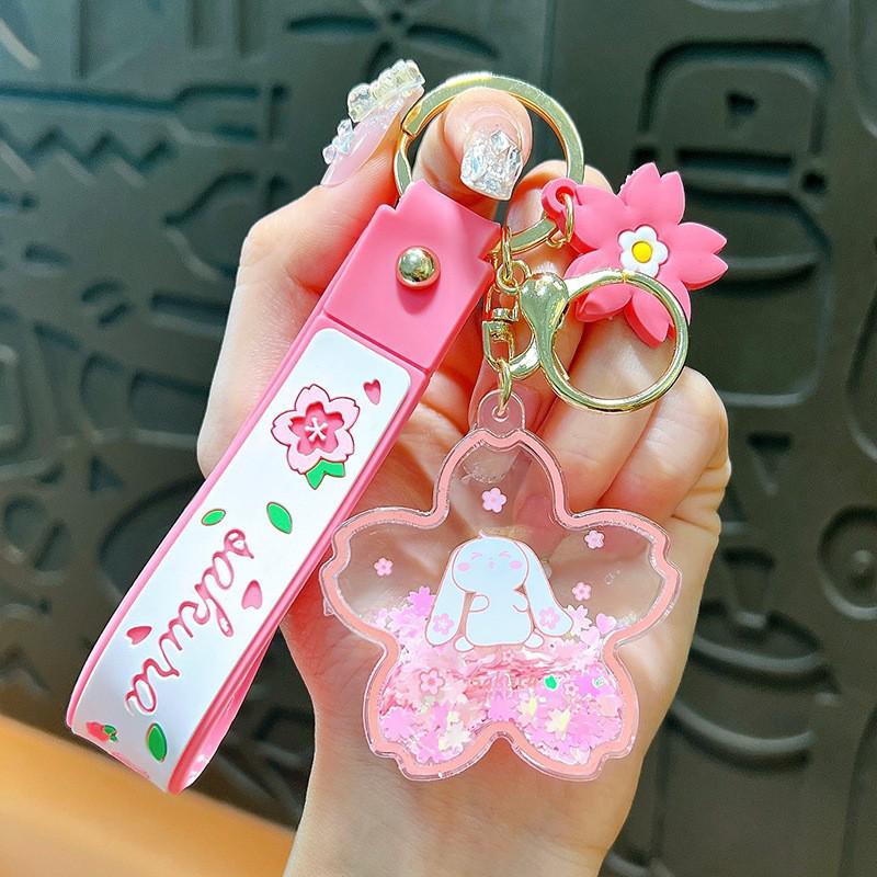 Exquisite Quicksand Panda Keychain: Cartoon Oil-Filled Doll Bag Pendant and Car Accessory