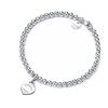 Pulsera de cuentas budistas en forma de corazón con un colgante de doble corazón esmaltado y resina epoxi – una pulsera de moda para mujer