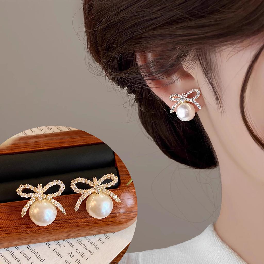 Bow earrings for women, light luxury and high-end earrings, 2026 new popular autumn and winter niche New Year earrings trend