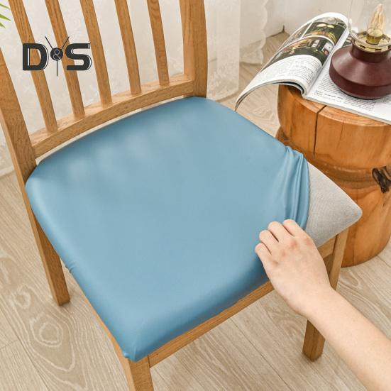 Pokrowiec na krzesło Wodoodporny Wysoka elastyczność Sztuczna skóra Antypoślizgowy Łatwa instalacja Ochraniacz siedziska Chroni przed zarysowaniami Zalania Olejoodporny Krzesło do jadalni