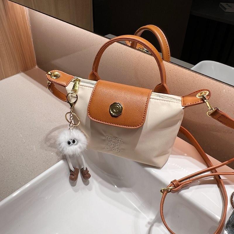 Mini Handheld Dumpling Bag For Women In Chic Nylon Perfect For Daily Use And Stylish Outings