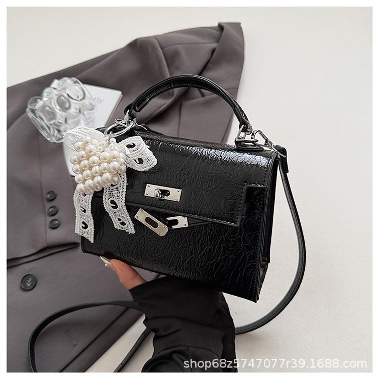 

Зарубежный заказ модный темперамент портативная маленькая сумка женская 2025 новая высококлассная текстура универсальная сумка-мессенджер сумка на плечо для通勤 чёрный