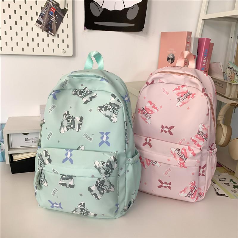 New small fresh junior high school college student schoolbag simple casual large capacity women's backpack light travel backpack