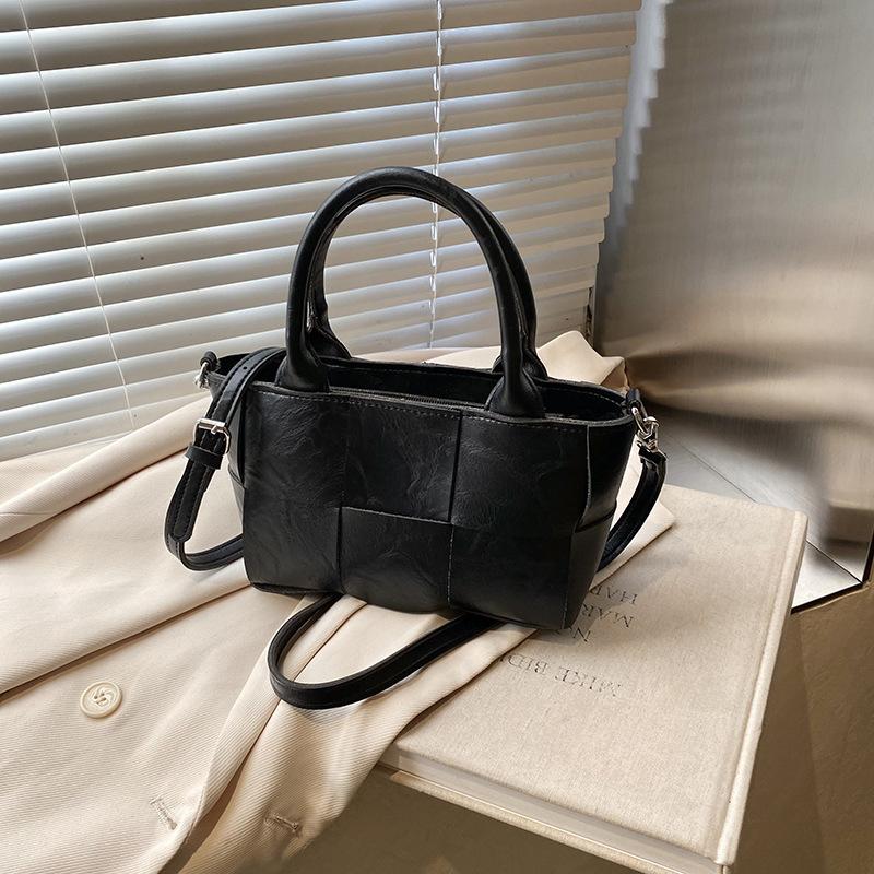 

Hot Sale Autumn and Winter Retro Maillard Niche Portable Bucket Bag Fashion Woven Wind Premium Messenger Women s Bag 27*9*13.5