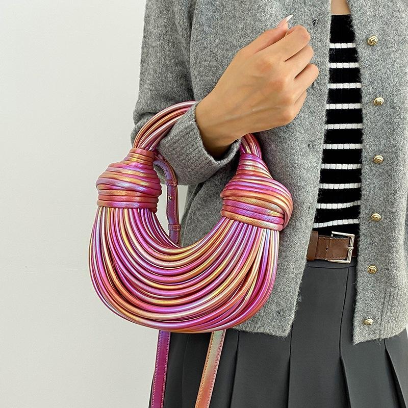 

Personalized and creative color noodle bag 2025 new Mori soft girl fashion laser hand carry messenger dumpling bag tide синій