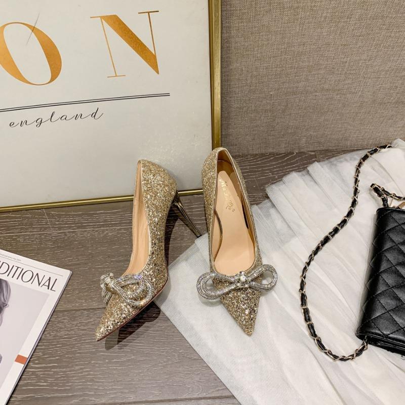 

Ранняя весна новые черные мелкие блестки высокие каблуки острый носок тонкие каблуки ужин сексуальные туфли-лодочки с бантом из страз женские 40