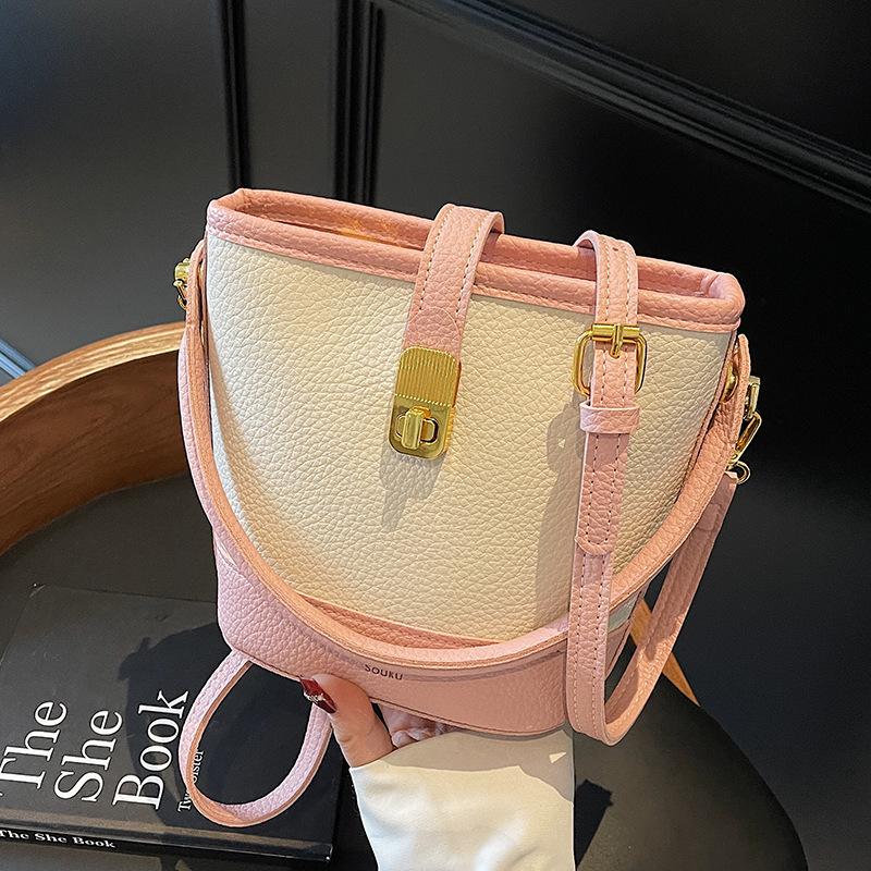 High-end niche contrasting color small bucket bag women's 2025 new Korean version fashion one-shoulder portable messenger bag