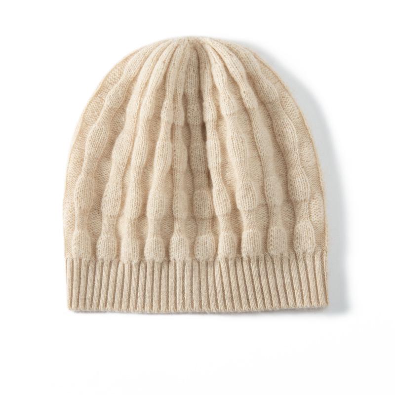 Dammössa med flätstickning i ren kashmir för öronen, för höst- och vintermode