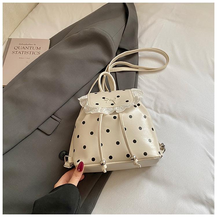 Schoolbag1011 spring new lace women's backpack sweet sister Korean polka dot casual personality foreign style small backpack
