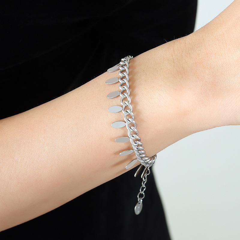 Thai Style Leaf Tassel Bracelet: Elegant Hand Jewelry in 18k Gold-Plated Titanium Steel