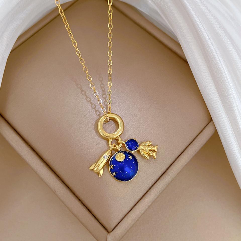 ZAKOL Gold Color Titanium Steel Chain Necklace Fashion Planet Astronaut Round Pendant Necklace Party Zircon Gift