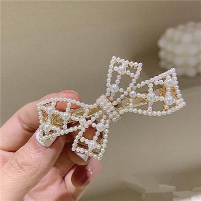 2024 Trendy Korean-French Retro Bow Pearl Hairpin for Women - Elegant Back of Head Accessory
