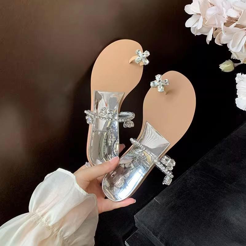 

Wang Xiaoxiao poison shoes one-word diamond with toe slippers women wear new flat sandals 34 тілесний