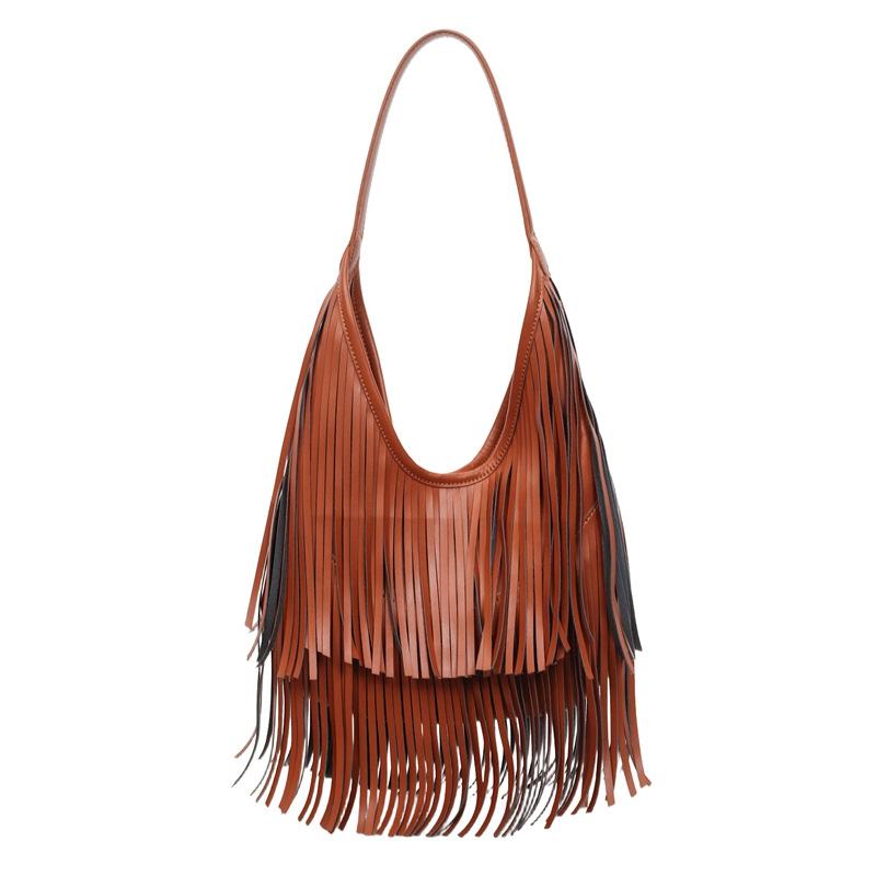 Large-capacity commuter fringed bag women's 2026 spring new retro go out hand carry shoulder armpit bag