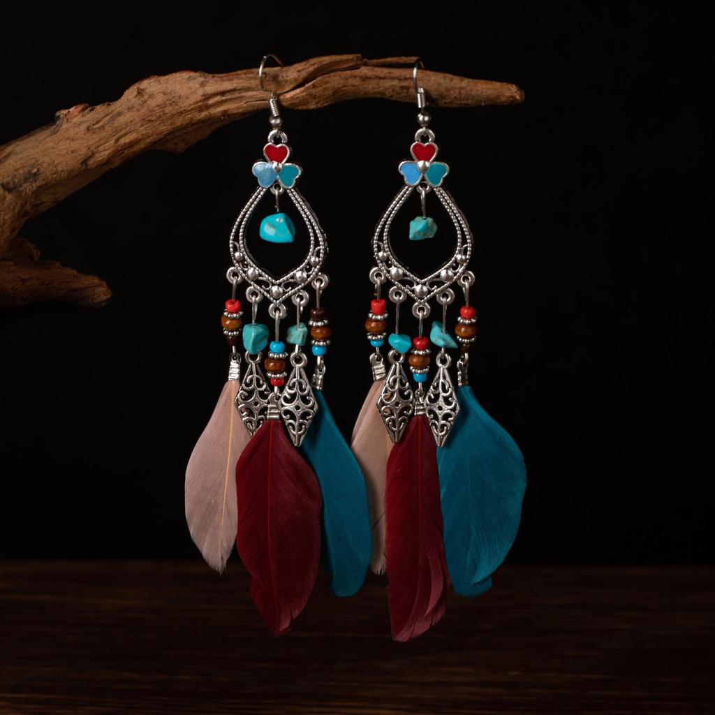 Bohemian Faux Silver Feather Tassel Mosquito Coil Earrings: Summer Retro Ethnic Ear Jewelry
