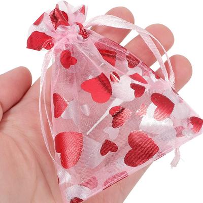 Ambalaj pentru cadouri
 – Saci de ambalare și organza