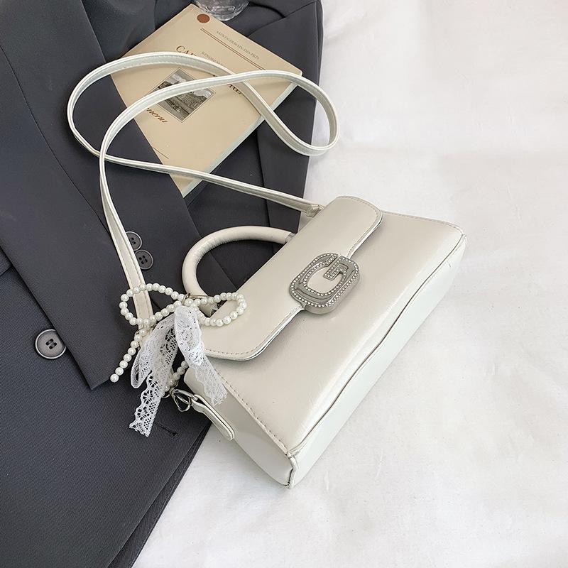 

Handbag bag women s new trend casual niche design sense fashion shoulder bag commuter messenger bag no pendant белый