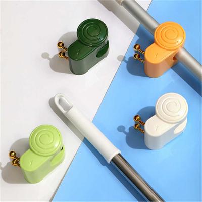 A Snail Mop Clip That Doesn't Require Drilling, Multifunctional Mop Storage Hook for Home Use In Bathrooms, and Broom Hooks.