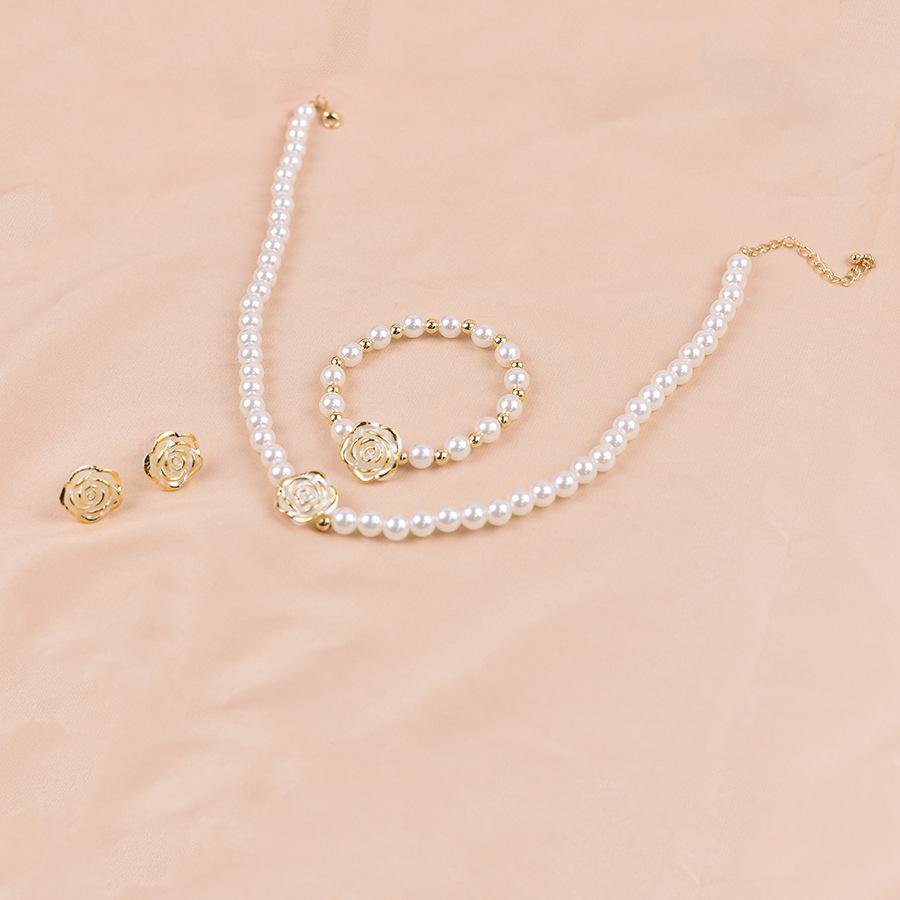 Elegant Vintage Court Style Camellia Pearl Jewelry Set: Necklace, Bracelet, and Stud Earrings