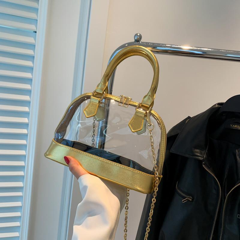 

Versatile Shell Handbag Fashion-forward Crossbody Bag Featuring Color Block Design For Style золотий