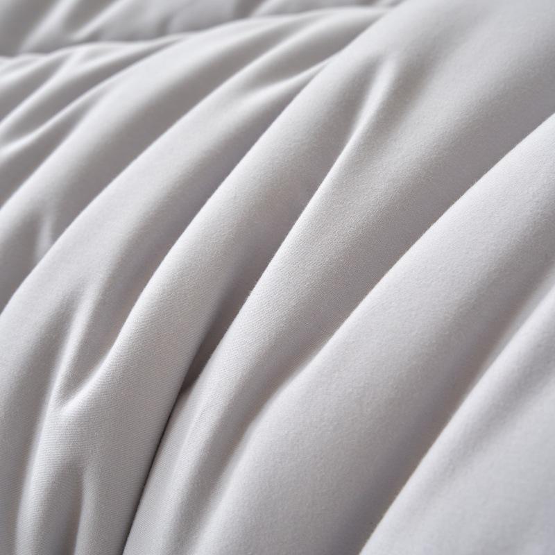 Feather Cotton Quilt: All-Season, Skin-Friendly, Washable, Pure Color, Warm Quilt for Single and Double, Ideal for Dormitory or Home Use.