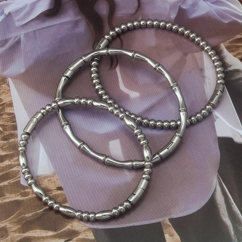 

Women s Bamboo Style Stainless Steel Titanium Bangle: Simple, Fashionable, Versatile