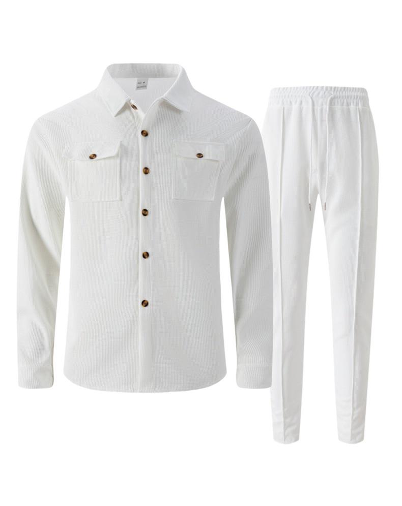 Completo casual da uomo autunnale europeo con giacca a maniche lunghe a nido d'ape e pantaloni