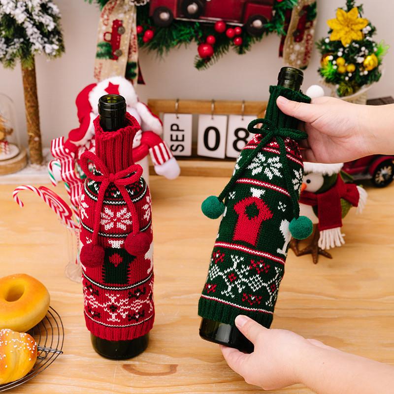Cozy Knitted Christmas Wine Bottle Cover With Bright Bow And Cheerful Pom Poms For Parties