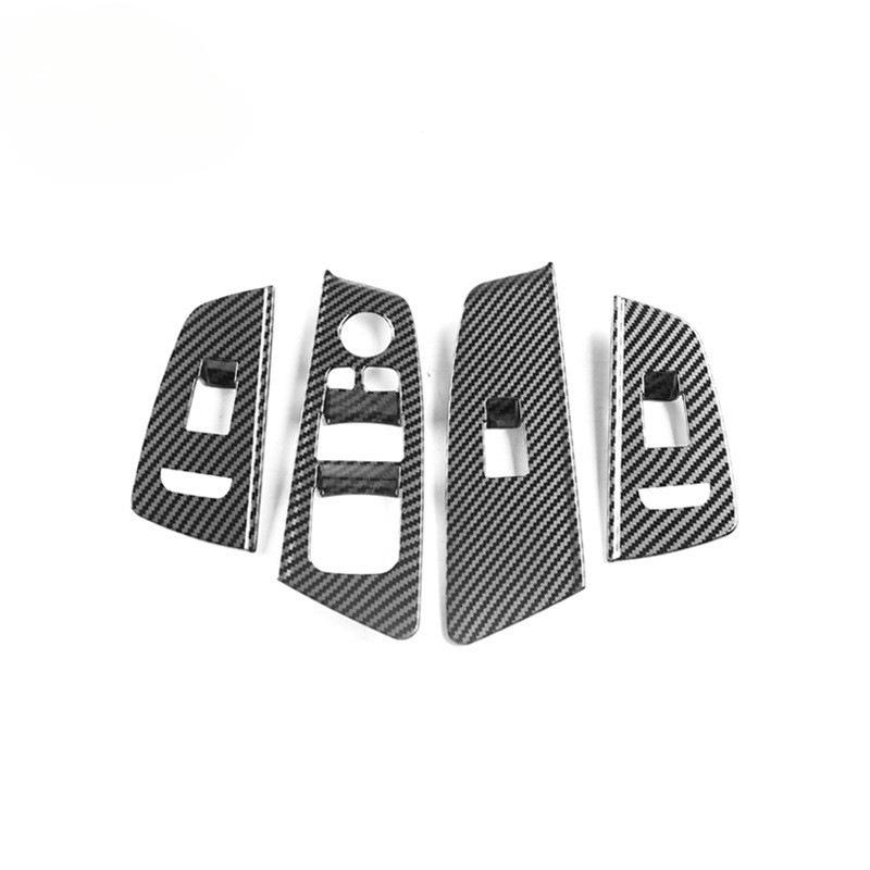 BMW 5 Series Carbon Fiber Interior Trim: Center Console, Gear Shift, Multimedia Panel, Air Vents.