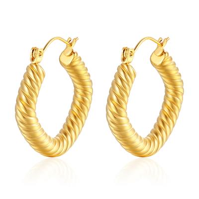 Das gleiche Ohrringmuster, das leichte Luxusohrringe wirft, Retro-Twist-Edelstahlmaterial, Temperament-Ohrbügel